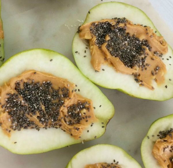 Delicious pears stuffed with peanut butter and chia Delicious pears stuffed with peanut butter and chia