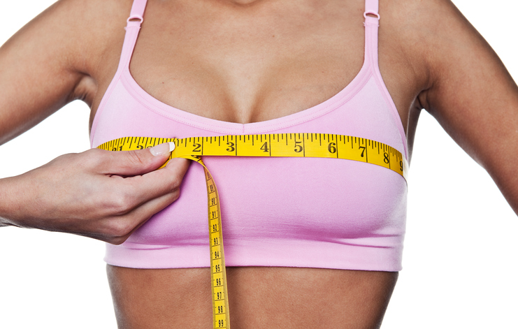 Woman taking measurements